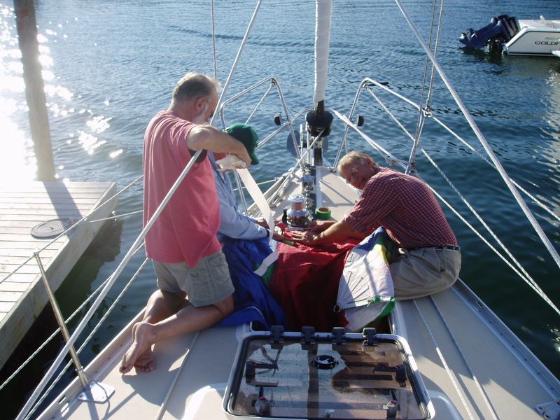 Sail repair crew ...