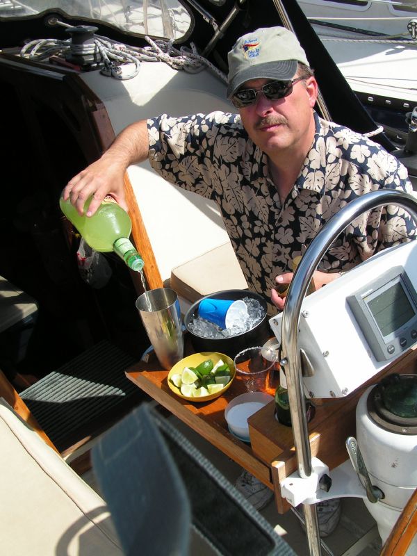 Corky pours margaritas