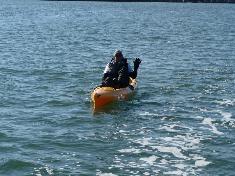 Bill paddles astern.