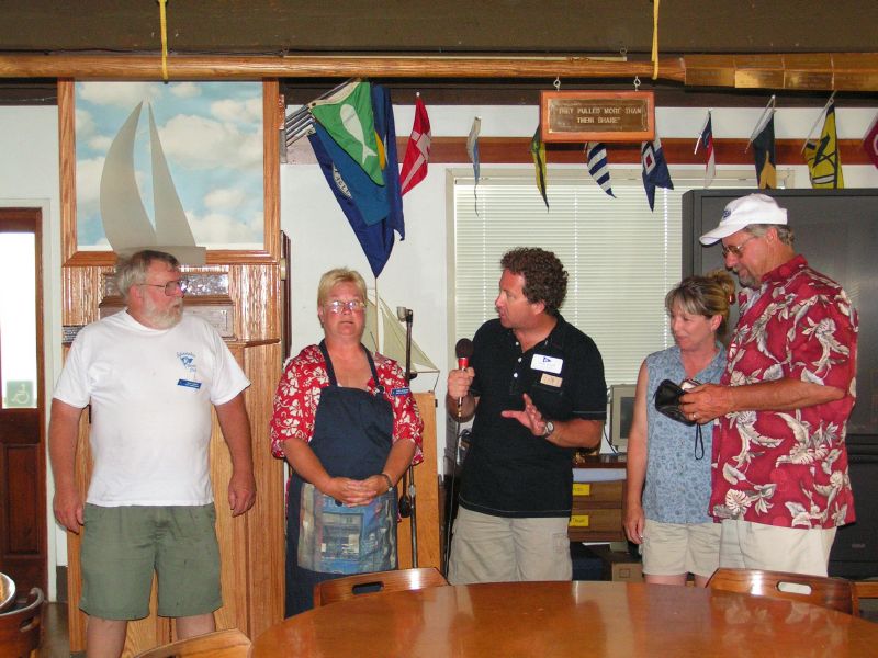 Tim presents Robin & Dick with Islander's<BR> check for their junior sailing program
