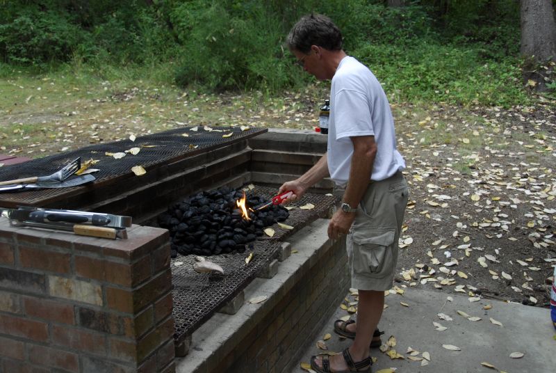 Bert lights the coals ...