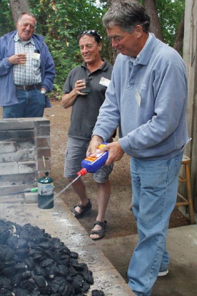 039 Bert Vermeer lights the BBQ....